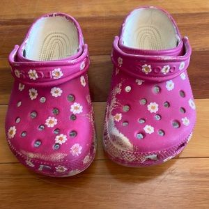 Painted on crocs, but some of the paint scraped off